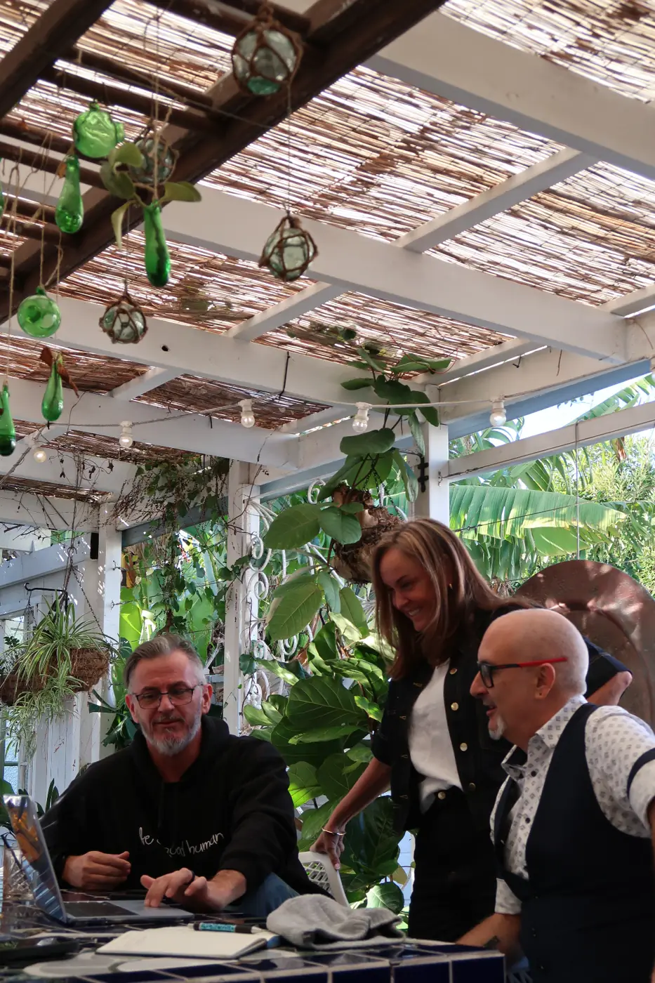 Mel and Adam with a client at an outdoor strategy session